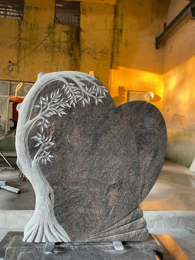 American Monuments Mahogany Granite Heart Shape Headstone with Carved Tree Mohagony