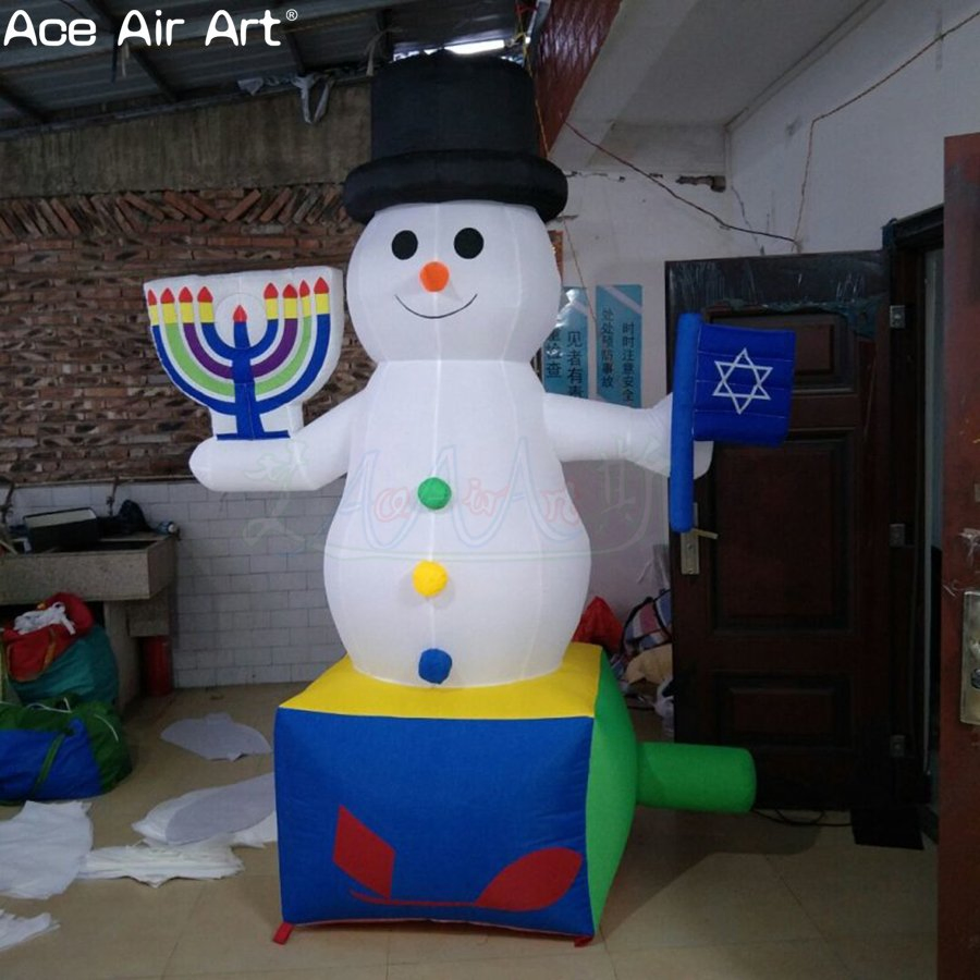 Custom-Made Inflatable Snowman Holding a Candlestick and a National Flag for Hanukkah Decorations.